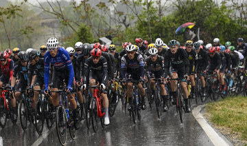 Groves wins wet Giro stage, Leknessund retains lead as Evenepoel falls twice