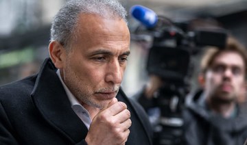 Swiss Islamic scholar Tariq Ramadan arrives on the second day of his trial at the Geneva court house on May 16, 2023. (AFP)