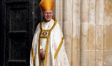 Archbishop of Canterbury Justin Welby smiles at Westminster Abbey in central London. (File/AFP)