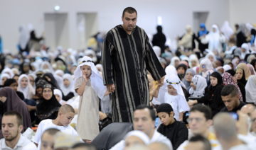 French Muslims listen to a sermon before the Eid Al-Fitr prayer in the Parc Chanot in Marseille, southeastern France. (File/AFP)