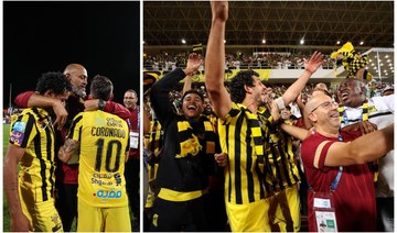 Al-Ittihad players and coach Nuno Santo celebrate the club's first league title in 14 years. (Twitter/@ittihad_en)