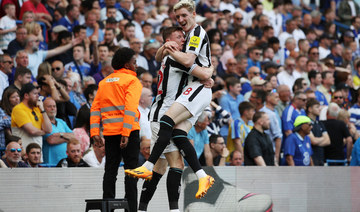 Newcastle United’s Anthony Gordon celebrates scoring their first goal with Elliot Anderson. (Reuters)