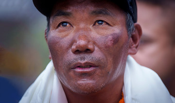 From highs to lows, Everest record breaker sees 'no future' in Nepal