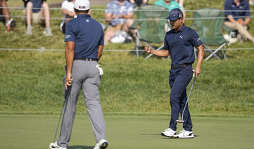 Suh, Matsuyama ride hot putts on steamy day at the Memorial