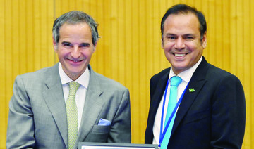 Saudi Arabia’s Jalawi bin Nasser Al-Qahtani receives IAEA’s certificate from  Rafael Grossi in Vienna. (Supplied)