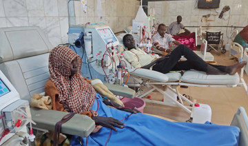 Sudanese patients suffering from kidney failure, undergo a dialysis  treatment at the Soba Hospital in southern Khartoum. (AFP)