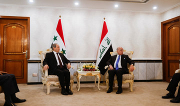 Syrian top diplomat discusses aid on visit to key ally Iraq 