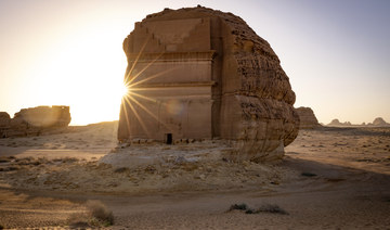 A photograph shows an ancient Nabataean carved tomb at the archaeological site of Hegra, near the northwestern city of AlUla.
