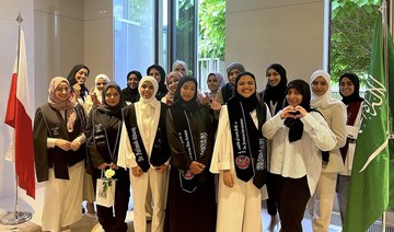 Saudi women who graduated from Polish universities in 2023 pose at the Saudi Embassy in Warsaw, Poland, on June 22, 2023. 