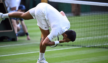 Djokovic, Swiatek triumph at Wimbledon as confetti-throwing protesters strike