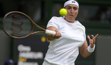 Tunisia's Ons Jabeur returns to Canada's Bianca Andreescu in a women's singles match on day six of Wimbledon
