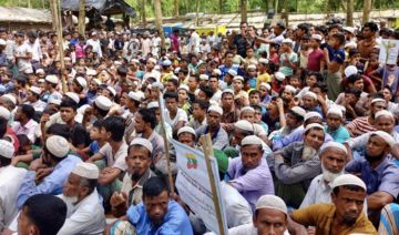 Rohingya refugees gather at the Kutupalong Refugee Camp to mark the fifth anniversary of their fleeing from neighbouring Myanmar
