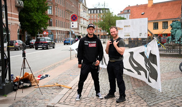 Protesters from the “Danish Patriots” demonstrate in front of the Iraqi embassy in Copenhagen, Denmark July 24, 2023. (Reuters)