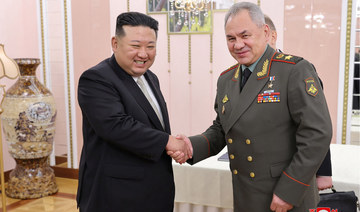 North Korea’s Kim gives Russia defense minister tour of arms expo