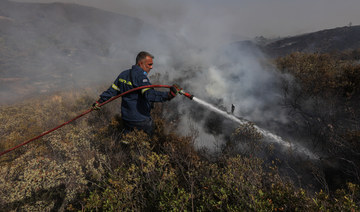 Wildfire in Greece triggers explosions at ammunition depot 