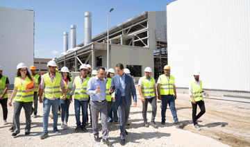 President Bashar al-Assad (C-R) touring the new power plant in the coastal city of Baniyas on August 3, 2023. (AFP)