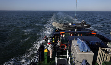 A rescue boat is prepared to help migrants following a problem with their boat’s engine in French waters.