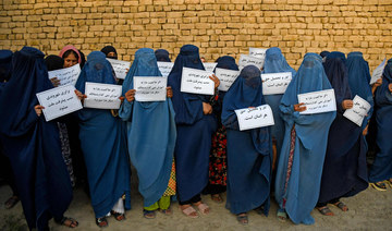 Afghan women take protests online as Taliban crush dissent
