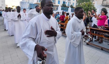 Tunisian interfaith procession calls for tolerance instead of hate
