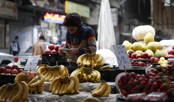 A shopkeeper waits for customers in Damascus, Syria. (File/AP)