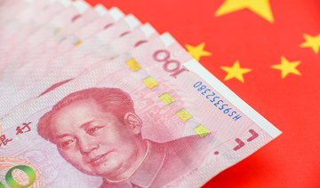 China’s yuan hits over 9-month low on weak economy 