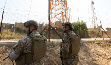 Lebanese army members stand in Houla near the Lebanese-Israeli border, southern Lebanon, July 4, 2023. (REUTERS)