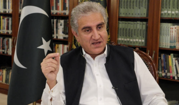 Pakistan's Foreign Minister Shah Mehmood Qureshi gestures as he speaks during an interview with Reuters