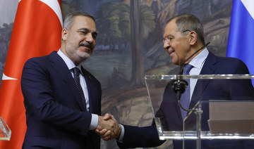 Russian FM Sergey Lavrov shakes hands with Turkish FM Hakan Fidan during a press conference in Moscow, Russia, on Aug. 31, 2023.