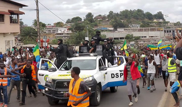 This video grab shows coup supporters cheering police officers in Libreville, Gabon, on Aug. 30, 2023. (AP)