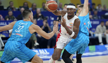 Doncic ejected and Canada top Slovenia; Germany, Serbia make the Olympics