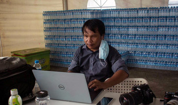 Myanmar photojournalist gets 20-year sentence over reports on cyclone’s aftermath, news site says
