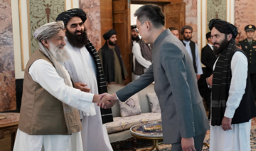 Newly appointed Chinese ambassador to Afghanistan Zhao Xing greets the Taliban’s PM Mullah Hassan Akhund in Kabul.