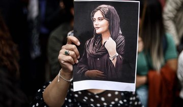 Iranian authorities briefly detain father of Mahsa Amini on her death anniversary