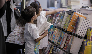 Children select books at the Riyadh International Book Fair. (File/AN photo/Huda Bashatah)