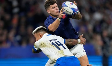 Jalibert’s magic helps sweep France past Italy into quarterfinals