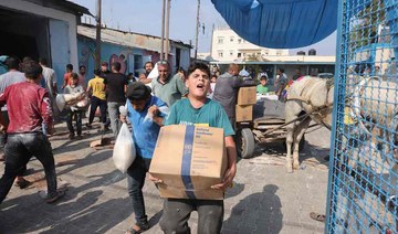 Gazans break into aid centers taking flour, supplies, UN says
