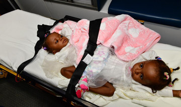 Nigerian conjoined twins arrive in Saudi Arabia for separation procedure
