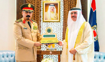 Gen. Sheikh Rashid bin Abdullah Al-Khalifa receives Maj. Gen. Mohammed bin Saeed Al-Moghedi in Manama. (Supplied)