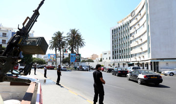 Security men guard the entrance to the Interior Ministry in the Libyan capital, Tripoli, on August 30, 2012. (AFP)
