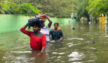 Heavy rains kill at least 12 before storm Michaung makes landfall on India's southeast coast