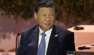 China’s Xi looks to strengthen Vietnam ties after Biden visit