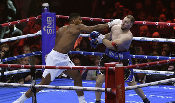 Joshua scores TKO over Wallin, Parker stuns Wilder in Riyadh double header 
