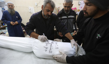 White burial shrouds are everywhere in Gaza as war deepens