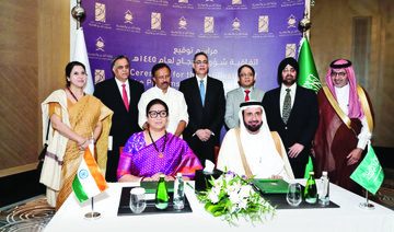 Saudi and India officials pose for a group photo after signing the Hajj deal in Jeddah. (Supplied)