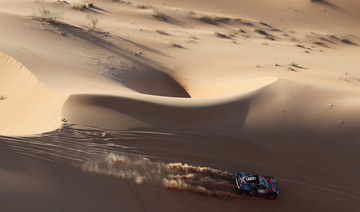 Evergreen Sainz holding back the sands of time to lead Dakar