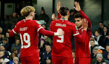 Liverpool survive Fulham scare to book League Cup final date with Chelsea