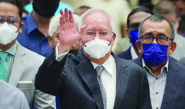 Malaysian ex-PM Najib’s  jail term halved to six years