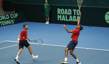 Rajeev Ram and Austin Krajicek win in doubles to lead the US past Ukraine in the Davis Cup