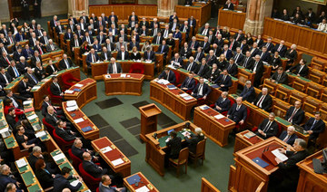 Hungarian Prime Minister Viktor Orban, bottom right, addresses a parliament session.