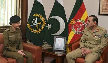In message to vigilantes, Pakistani army chief lauds cop for saving woman from blasphemy mob